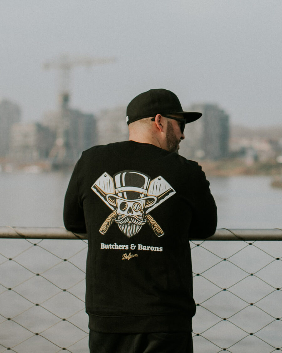 Loyalty black sweater by Butchers & Barons with skull, beard and monocle.